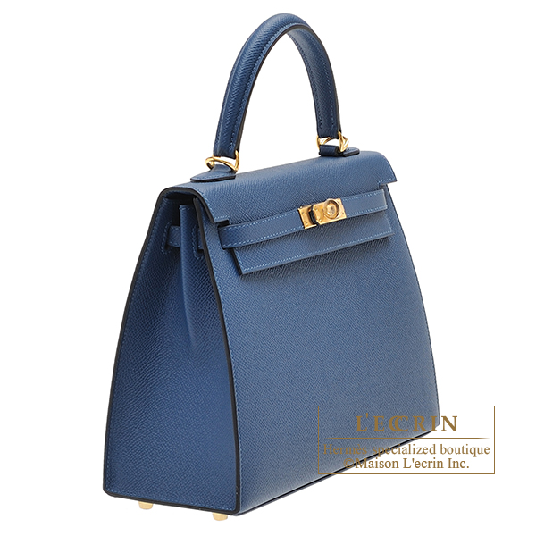 A DEEP BLUE OSTRICH LEATHER BIRKIN 25 WITH GOLD HARDWARE